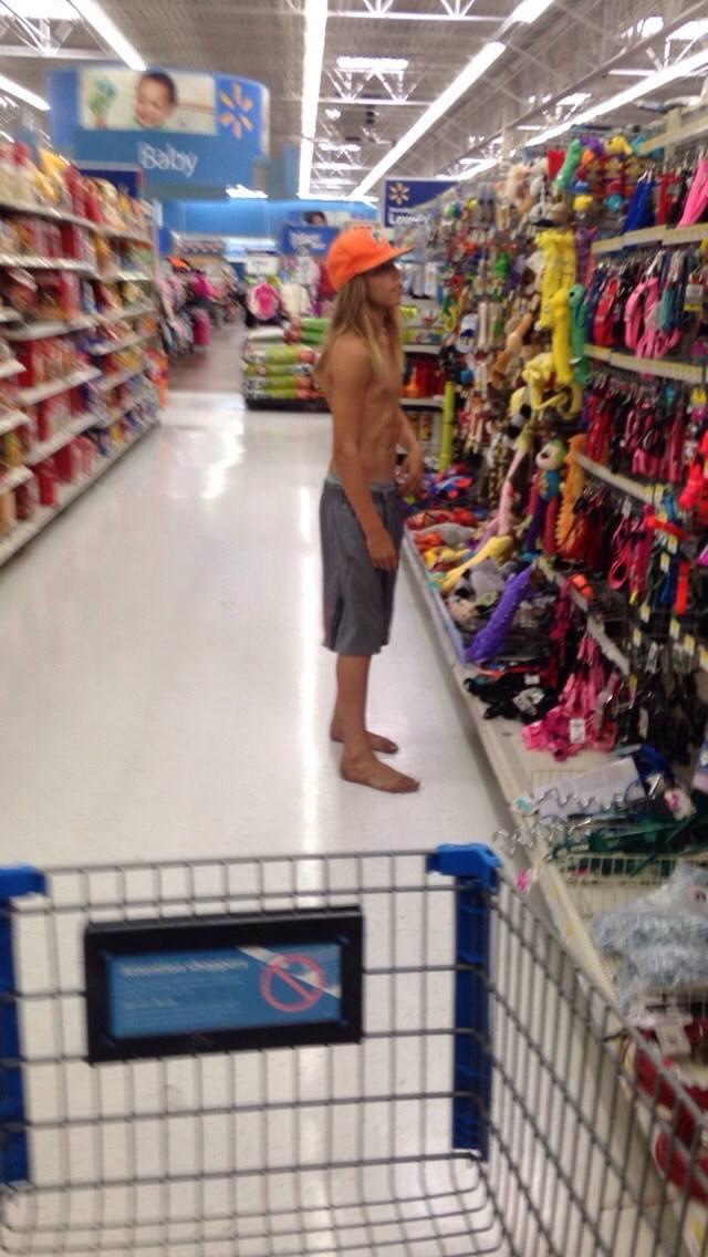 A Florida man spotted in their usual habitat: shirtless in a Walmart.